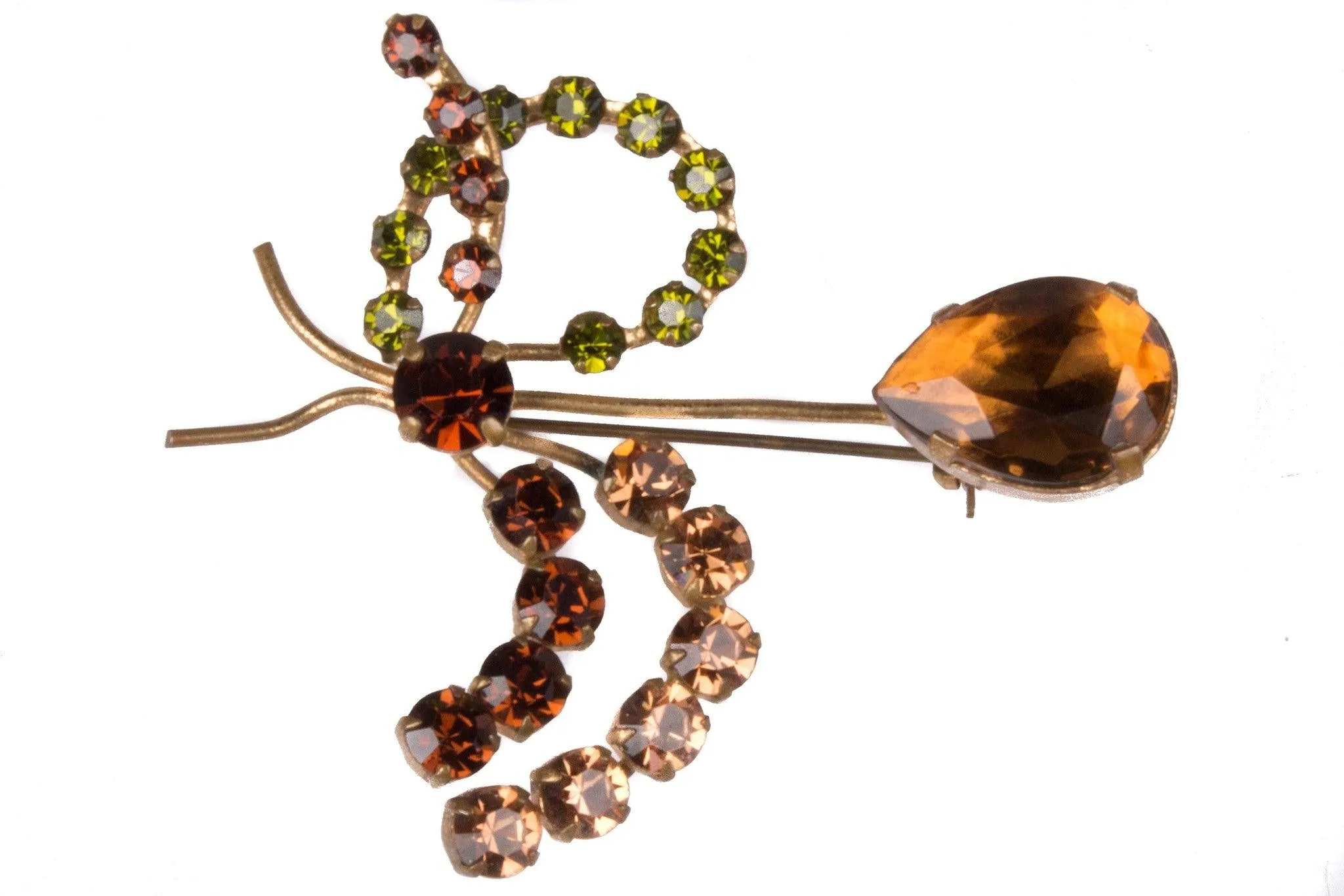 Delicate paste brooch with amber and green stones