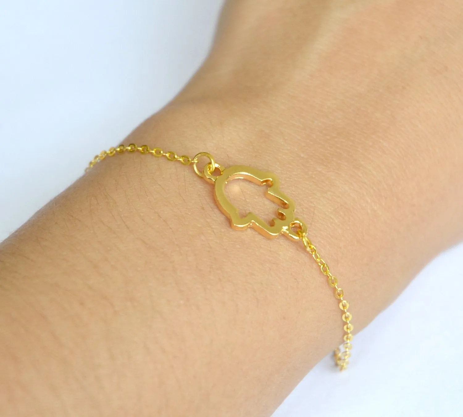 Gold chain bracelet with a gold plated Hamsa charm, evil eye protection, gift for her