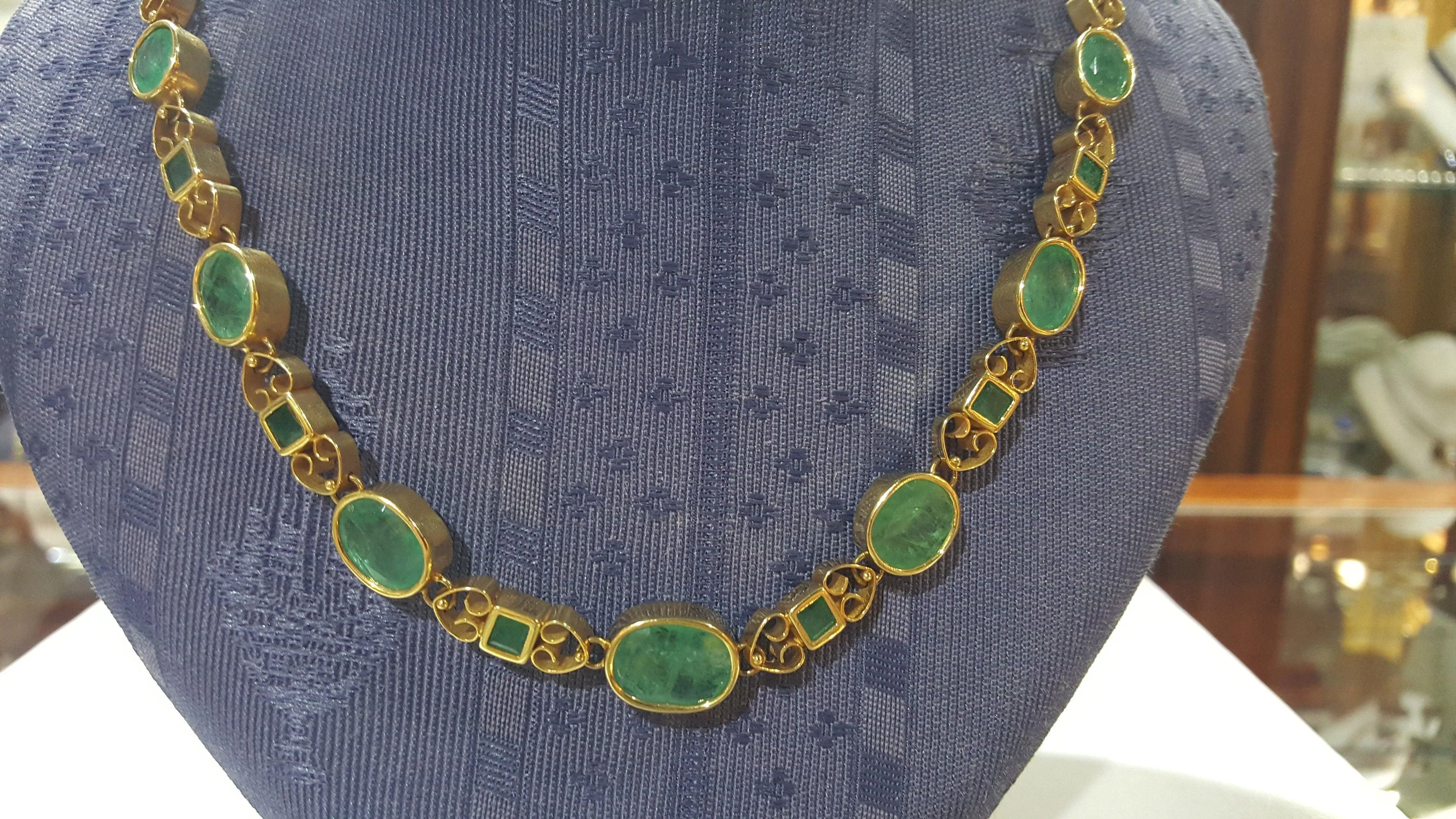 Necklace in 18k gold Perforated with Zambian emeralds